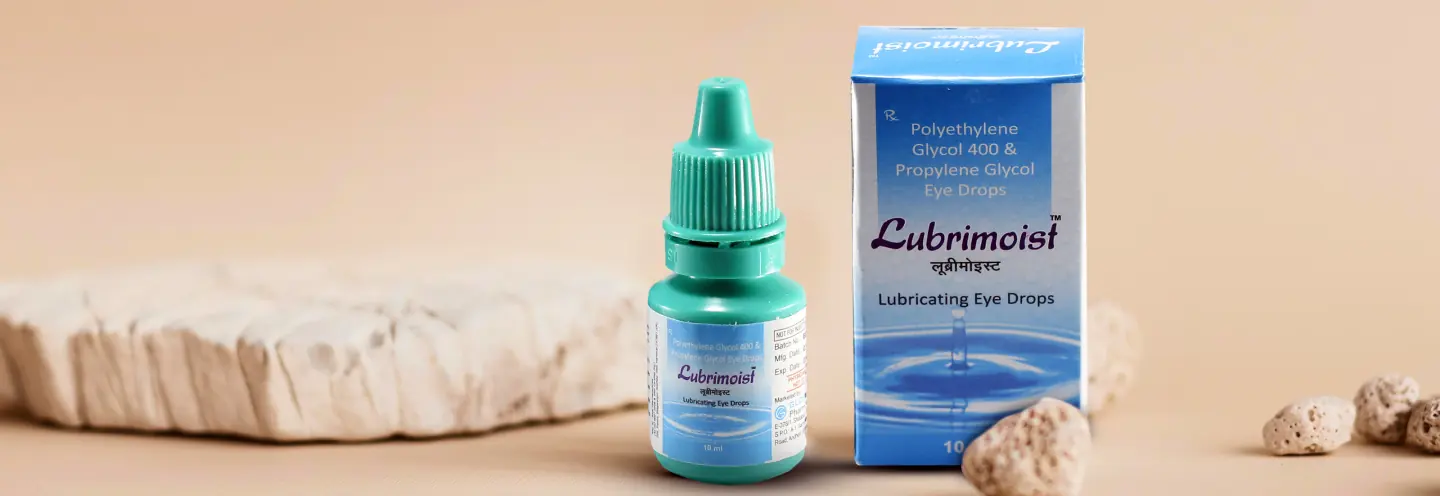 Lubrimoist eye drops bottle and pack on a stone surface